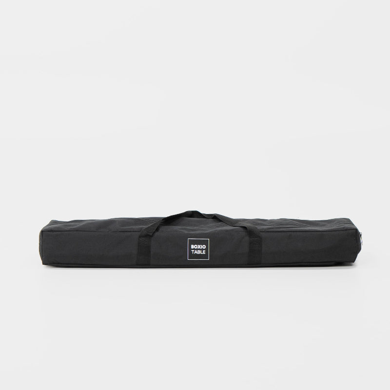 Black carrying bag for a BOBO TABLE on a white background