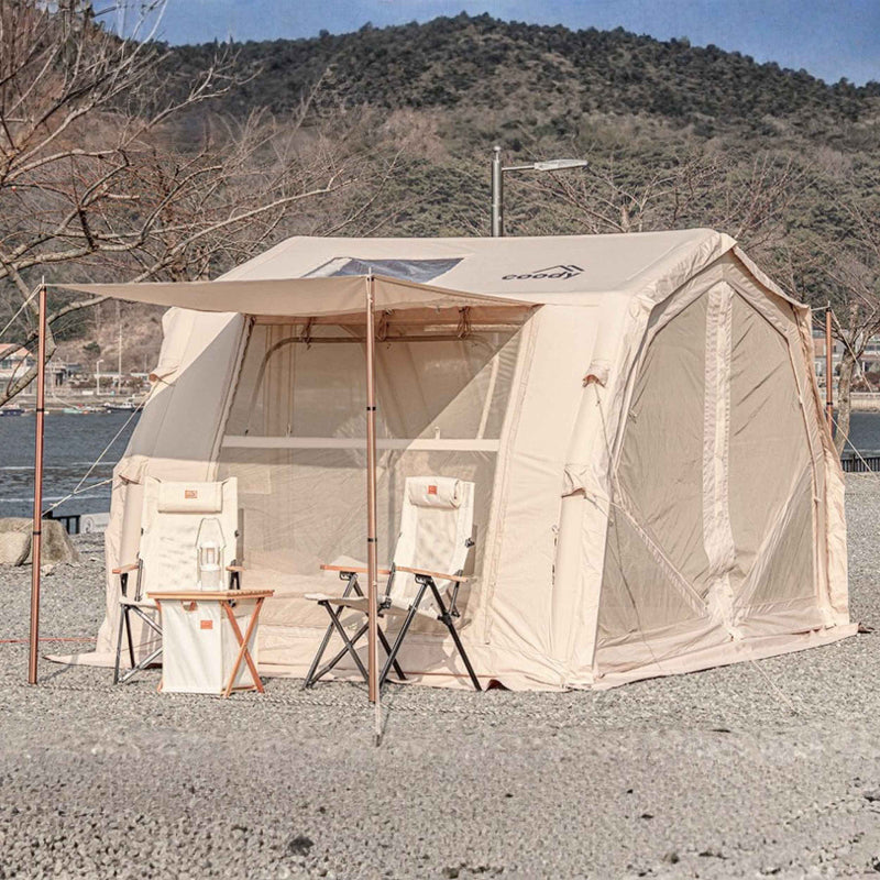 Coody 10.0 Pro in beige exterior view with table and chairs.