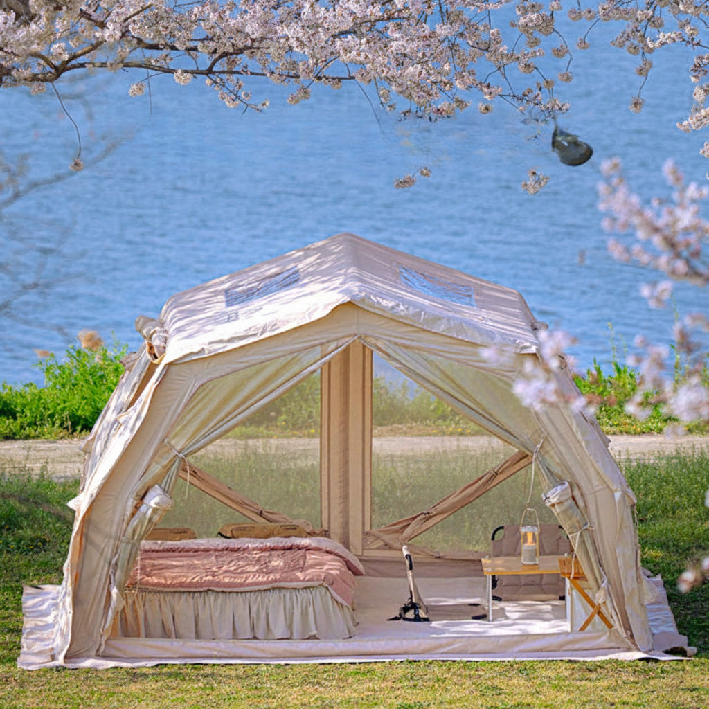 Cody 10.0 Pro premium canvas tent in beige set up near lake.