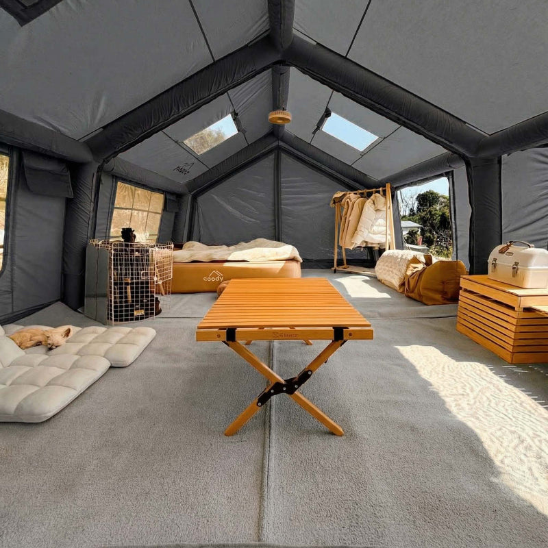 Coody 17.2 gray inflatable tent interior view with carpet and furniture showing air beam technology and sky lights.
