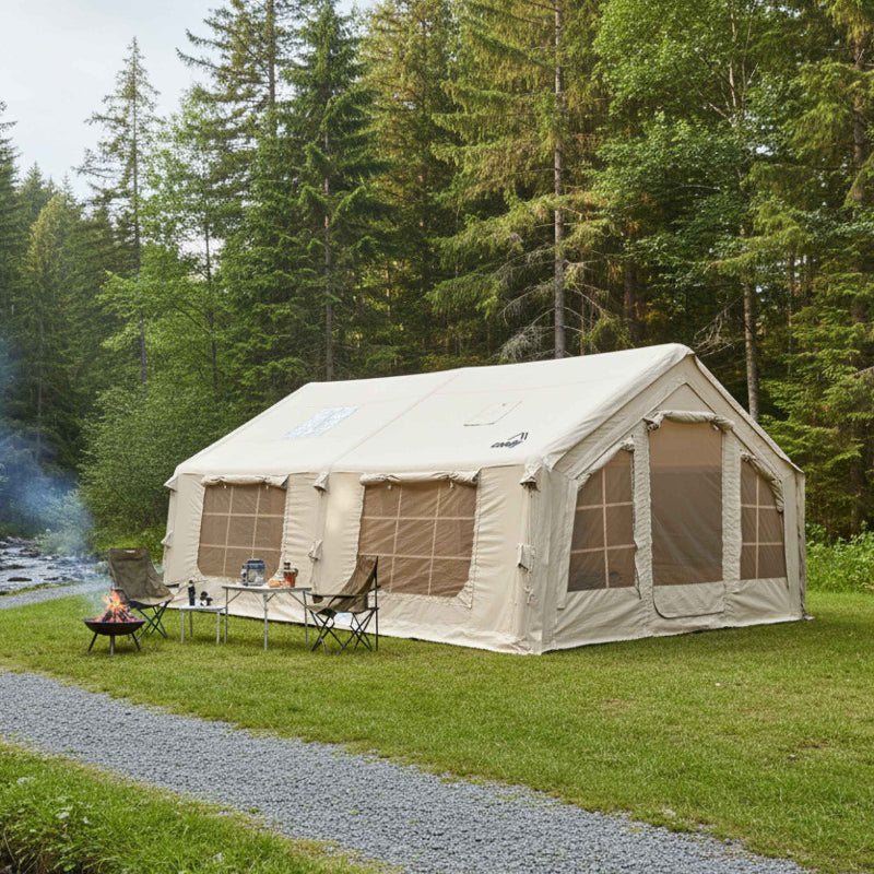 Coody 17.2 Large Beige Inflatable Tent with fire pit  in forest setting.