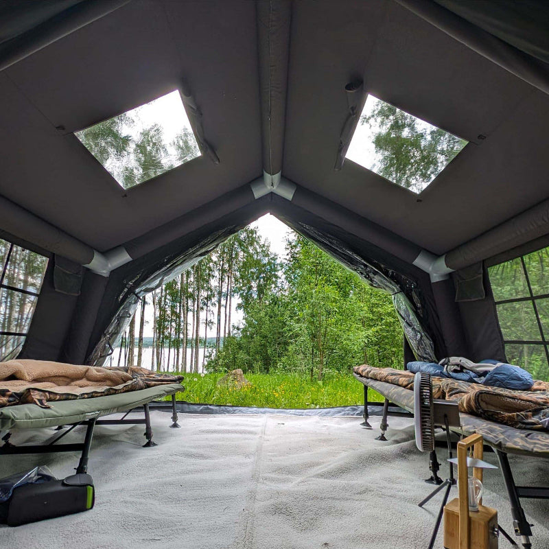 Coody 17.2 Koala 7 Inflatable Tent in black interior view of reinforced air beams and sky lights with furniture.