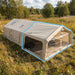 Coody AirTarp Inflatable Canopy in beige exterior view in field.