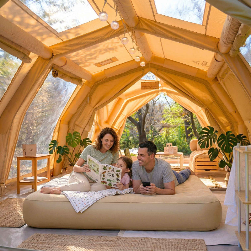 Coody Coreo queen, beige air mattress in tent with family laying on it.