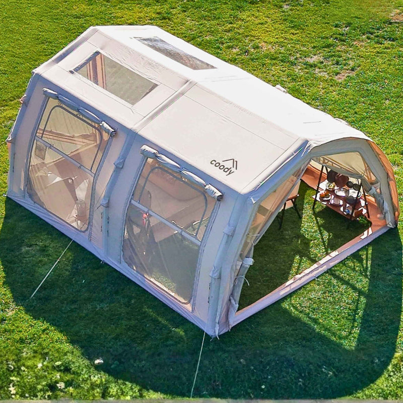 Coody Familia 17.2 Pro beige inflatable camping tent exterior view on grass.