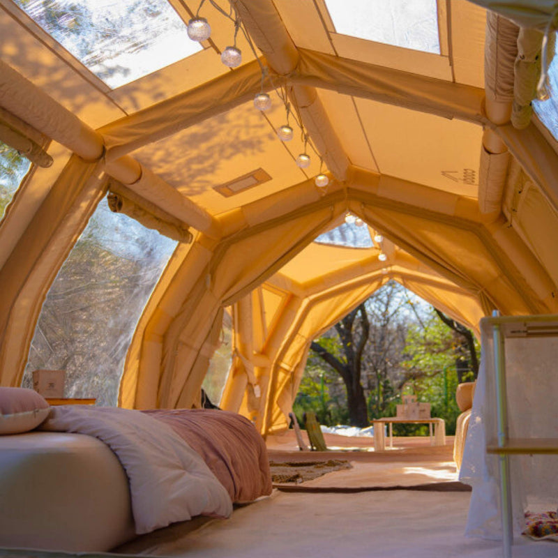 Coody Familia 17.2 Pro beige inflatable tent interior living space with furniture. 