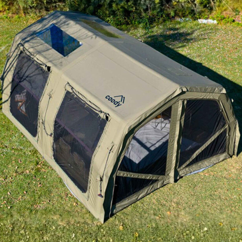 Coody Familia AirTent 17.2 Pro forest green inflatable camping tent exterior view on grass.