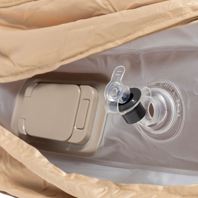 Close-up of Coody inflatable air mattress with valve and beige cover