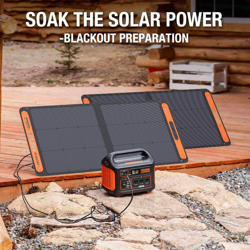 Jackery SolarSaga 100W Solar panels plugged into Jackery portable power station on deck