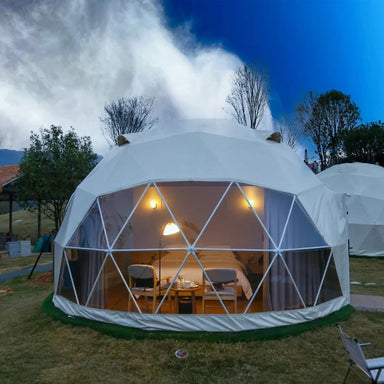 Wilderness Dome 16' luxury glamping dome tent setup with large panoramic thermoplastic polyurethane (TPU) window