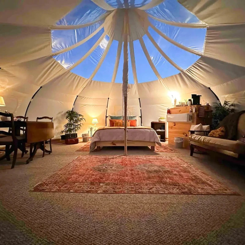 Wilderness Resource Astral Glamping Tent with furnished  interior of clear vinyl skylight for natural light