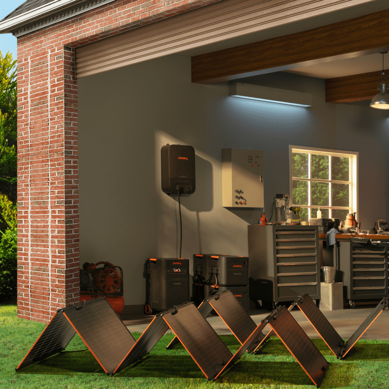 Jackery Explorer 5000 Plus high capacity power station charging in garage for outdoor adventures and home backup
