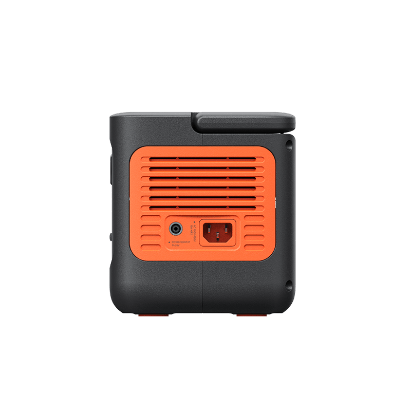 Jackery 300 v2 Black and orange portable power station on a white background