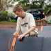 Jackery Solar Panel Connector with man connecting it to solar panels